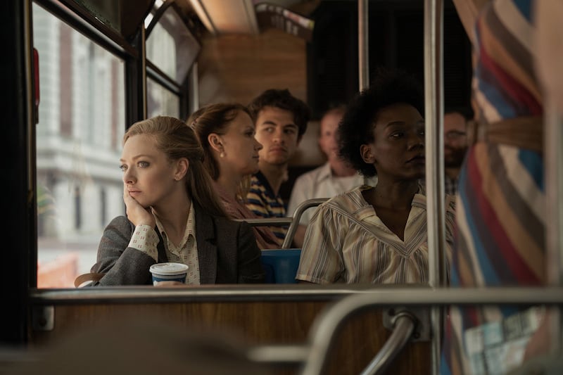 Amanda Seyfried on a bus in a scene from The Crowded Room.