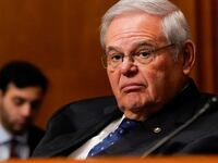 Bob Menendez stares forward during a hearing in Congress.