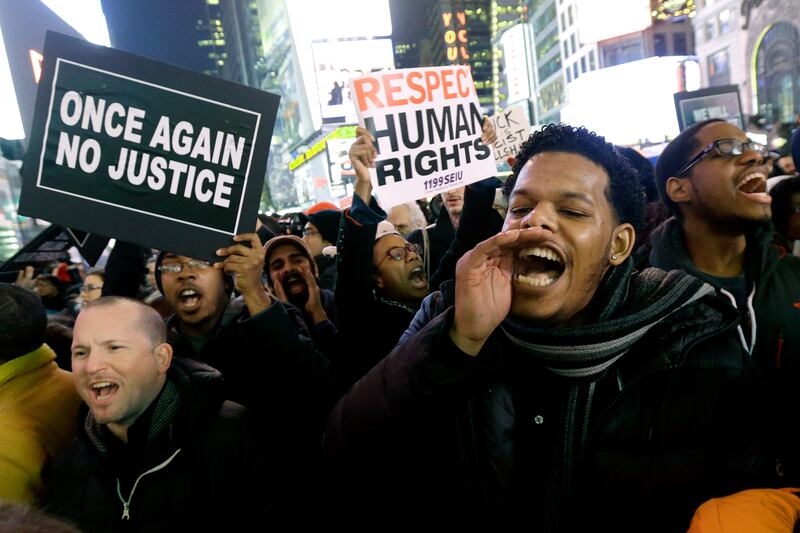 articles/2014/12/03/the-policies-behind-eric-garner-s-death/141203-garner-protest1_hc9txd