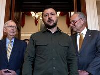 Ukrainian President Volodymyr Zelensky (C) speaks to reporters briefly following a meeting with Senate Minority Leader Mitch McConnell (R-KY) (2nd L), Senate Majority Leader Charles Schumer (D-NY) (2nd R)