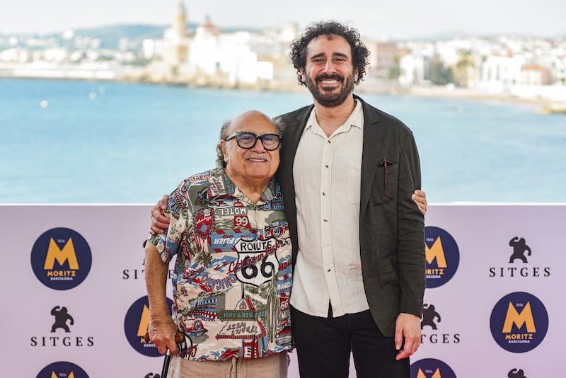 Actor Danny DeVito with his son, producer and director Jacob "Jake" DeVito, at the photocall for the film "Drag" at the Sitges Film Festival on 15 October 2026, in Spain.