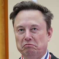 WASHINGTON, DC - OCTOBER 08: Tesla and SpaceX CEO Elon Musk (C) reacts after being awarded the National Medal of Science during the Golden Age of American Innovation Summit at the Institute of Peace on October 08, 2026 in Washington, DC. Trump awarded some of the nation's highest scientific honors to technology leaders including Elon Musk, Sergey Brin, Jensen Huang, Lisa Su, Michael Dell, and Satya Nadella. (Photo by Win McNamee/Getty Images)