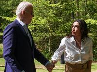 AOC hand in hand with Joe Biden