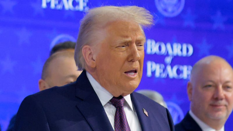 DAVOS, SWITZERLAND - JANUARY 22: U.S. President Donald Trump presents the “Board of Peace” onstage at the World Economic Forum (WEF) on January 22, 2026 in Davos, Switzerland. The annual meeting of political and business leaders comes amid rising tensions between the United States and Europe over a range of issues, including Trump's vow to acquire Greenland, a semi-autonomous Danish territory. (Photo by Chip Somodevilla/Getty Images)