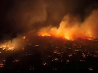 An aerial view of a wildfire in Maui County, Hawaii