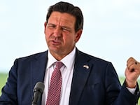 Florida Governor Ron DeSantis speaks during a press conference at the South Florida Detention Facility, nicknamed "Alligator Alcatraz," at the Dade-Collier Training and Transition Airport in Ochopee, Florida, on June 25, 2026. DeSantis announced that the facility is now closed and all detainees have been relocated. (Photo by CHANDAN KHANNA / AFP via Getty Images)