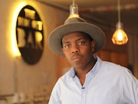 articles/2015/07/17/the-dose-of-cool-that-saved-johannesburg/150716-ferguson-south-africa-tease_vwkm8c