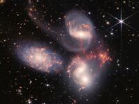 IN SPACE - JULY 12: In this handout photo provided by NASA, NASA's James Webb Space Telescope reveals Stephans Quintet, a visual grouping of five galaxies, in a new light on July 12, 2022 in space. This enormous mosaic is Webb's largest image to date, covering about one-fifth of the Moons diameter. It contains over 150 million pixels and is constructed from almost 1,000 separate image files. The information from Webb provides new insights into how galactic interactions may have driven galaxy evolution in the early universe. (Photo by NASA, ESA, CSA, and STScI via Getty Images)