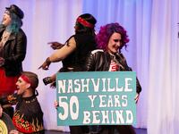 Members of Friends of George’s perform on the stage after a federal judge temporarily blocked a law bill aimed to restrict drag performances in public or in front of children in Memphis, Tennessee, U.S., April 21, 2023.