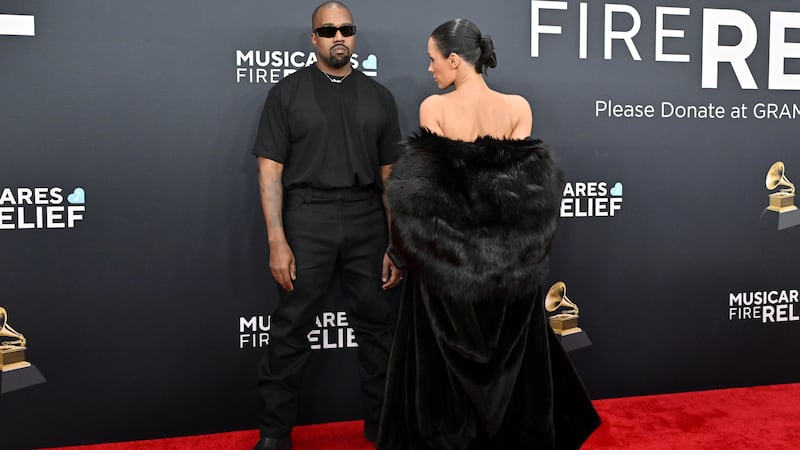 LOS ANGELES, CALIFORNIA - FEBRUARY 02: (FOR EDITORIAL USE ONLY) (EDITOR'S NOTE: Image contains nudity) Kanye West and Bianca Censori attend the 67th GRAMMY Awards at Crypto.com Arena on February 02, 2025 in Los Angeles, California.
