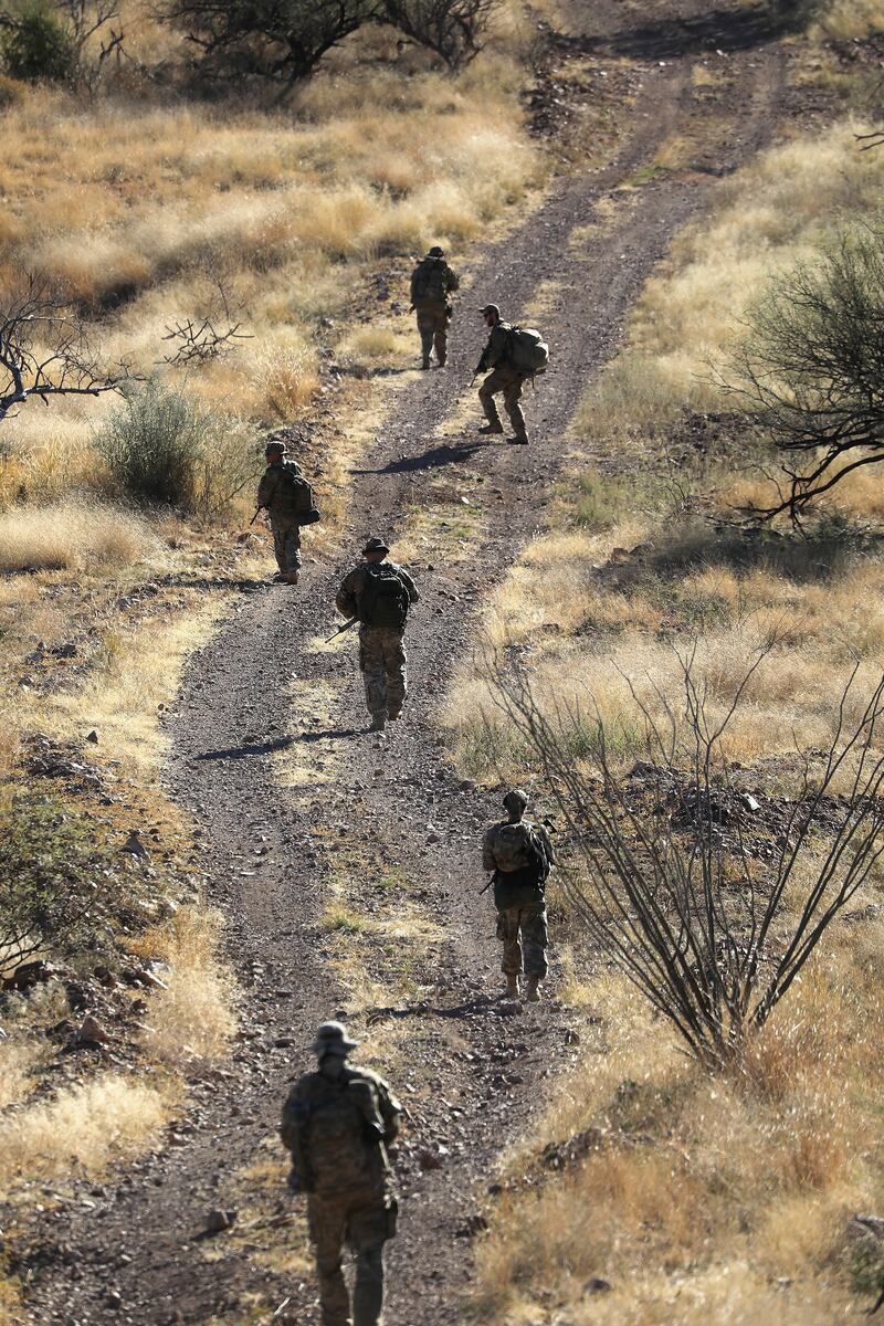 Civilian paramilitaries, part of the “Arizona Border Recon,” patrol for migrants in an area near Arivaca, Arizona, in 2016.