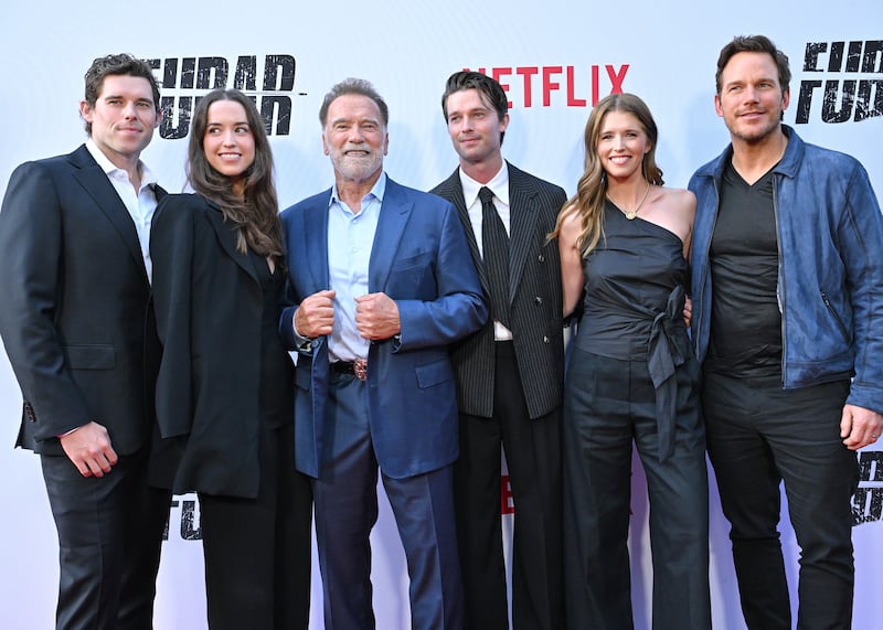 Five members of the Schwarzenegger family, including Christopher, Christina, Arnold, Patrick, and Katherine, posing alongside actor Chris Pratt at the season 2 premiere of Netflix's "FUBAR" on June 11, 2025.