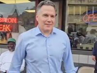 GOP Senate candidate Dave McCormick stands outside Max’s Steaks in Philadelphia.