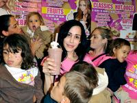 Octomom Nadya Suleman and her large family plus helpers launch their signature Milkshake at 'Millions of Milkshakes' on November 10, 2010 in West Hollywood, California.