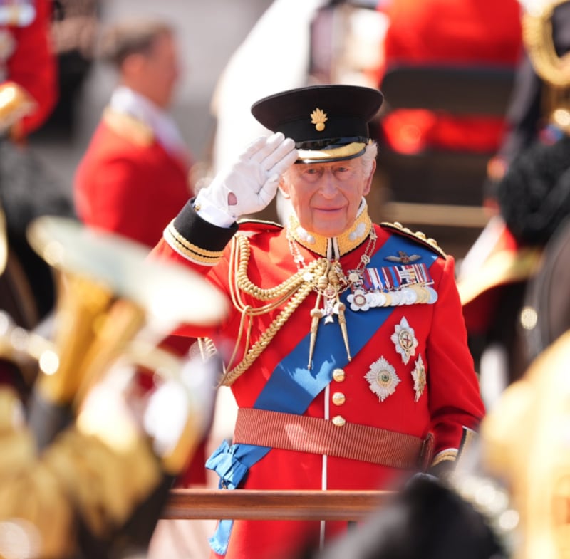 King Charles saluting Armed Forces during Trooping the Colour