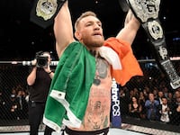Conor McGregor of Ireland celebrates his KO victory over Eddie Alvarez of the United States in their lightweight championship bout during the UFC 205 event at Madison Square Garden on November 12, 2016 in New York City.