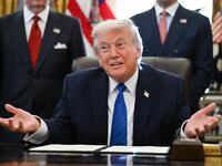 President Donald Trump speaks before signing executive orders in the Oval Office in the White House in Washington, DC, on January 30, 2026.