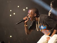 articles/2014/12/23/bobby-shmurda-and-rap-s-ultimate-hoop-dream/141222-kameir-shmurda_-tease_pvuttt