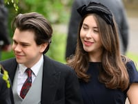 Samuel Chatto and Eleanor Ekserdjian arrive for the Royal wedding of Peter Phillips and Harriet Sperling.