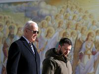 U.S. President Joe Biden walks with Ukrainian President Volodymyr Zelenskiy at St. Michael's Golden-Domed Cathedral during an unannounced visit, in Kyiv, Ukraine, Monday, Feb. 20, 2023.