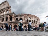 Tourists admire the Colosseum in Rome, Italy, on April 26, 2025.