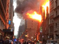 cheats/2016/05/01/massive-fire-breaks-out-at-nyc-church/160501-manhattan-church-fire-cheat_vgbisn
