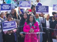 Fearless Fund CEO Arian Simone, center, speaks outside U.S. Supreme Court in Washington, D.C.