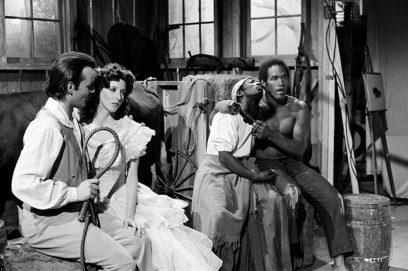 Bill Murray as farmer, Laraine Newman as farmers daughter, Garrett Morris as farmer, O.J. Simpson as Mandingo during the "Mandingo II" skit on February 25, 1978.