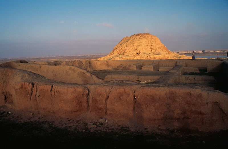 A photograph of the ruins of a ziggurat in Assur or Qal'at Shirqat, a Unesco World Heritage Site in Iraq.