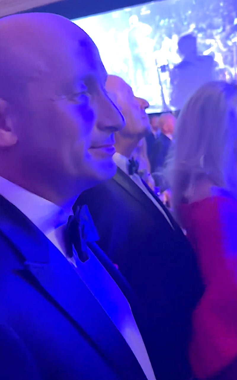 Stephen Miller looks uncomfortable as he 'enjoys' a performance of Ice Ice Baby by Vanilla Ice at Donald Trump's NYE party at Mar-a-Lago.