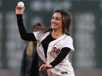 Karenna Groff, NCAA Woman of the Year, throws out the first pitch at Fenway Park in April 2023.