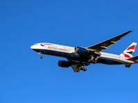 A British Airways Boeing 777 plane landing.