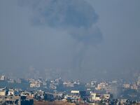 Smoke billows over Gaza after an Israeli airstrike.