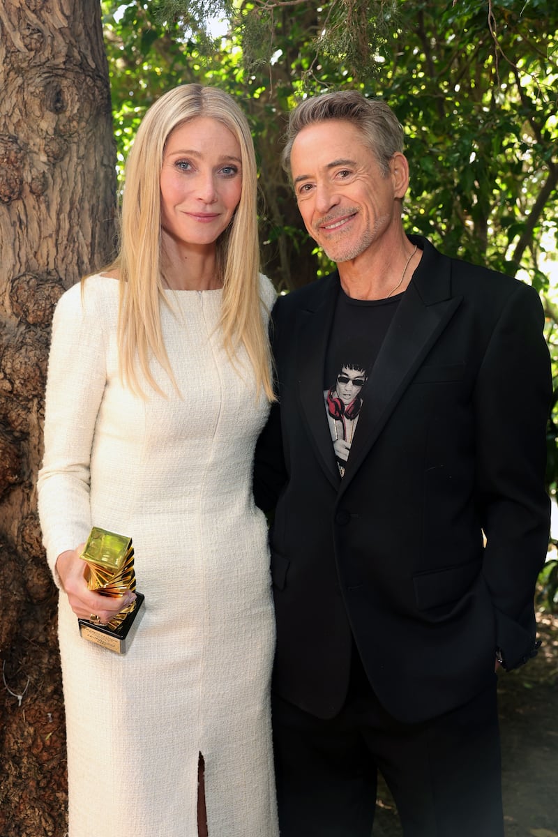 BEVERLY HILLS, CALIFORNIA - DECEMBER 03: (L-R) Honoree Gwyneth Paltrow, recipient of the Sherry Lansing Leadership Award, and Robert Downey Jr. attend The Hollywood Reporter Women In Entertainment Presented By Lifetime at The Beverly Hills Hotel on December 03, 2025 in Beverly Hills, California. (Photo by Stefanie Keenan/The Hollywood Reporter via Getty Images)