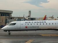 ARLINGTON, VIRGINIA - MAY 16: An Air Canada Express regional jet taxis at Ronald Reagan Washington National Airport on May 16, 2025 in Arlington, Virginia. (Photo by Kevin Carter/Getty Images)