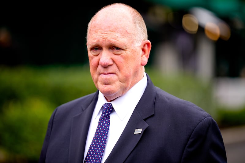 White House border czar Tom Homan takes a question from members of the media as he walks back towards the West Wing of the White House following a television interview on May 29, 2025 in Washington, DC.