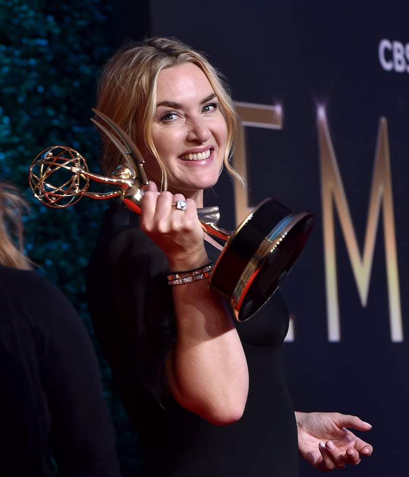 Kate Winslet holding her Emmy award for "Mare of Easttown."