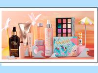 Various beauty products on a light orange background resembling a beach.