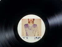 articles/2014/10/25/taylor-swift-s-1989-country-s-prodigal-daughter-trades-in-her-boots-and-spurs-for-louboutins/141024-stern-tswift-tease_ctbj0j