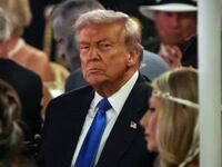 PALM BEACH, FLORIDA - OCTOBER 31: US President Donald Trump talks with guests during a Halloween party at his Mar-a-Lago estate on October 31, 2025 at Palm Beach, Florida. Trump is spending the weekend at his Mar-A-Lago estate in Palm Beach, Florida. (Photo by Samuel Corum/Getty Images)