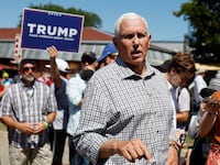 Mike Pence, one of the participants in the first GOP primary debate, campaigns for the 2024 Republican presidential nomination at the Iowa State Fair in Des Moines, Iowa, Aug. 11, 2023.