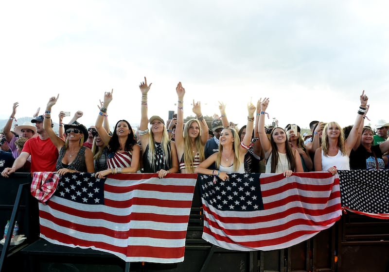 Music fans attend day two of 2015 Stagecoach, California's Country Music Festival, at The Empire Polo Club on April 25, 2015, in Indio, California.