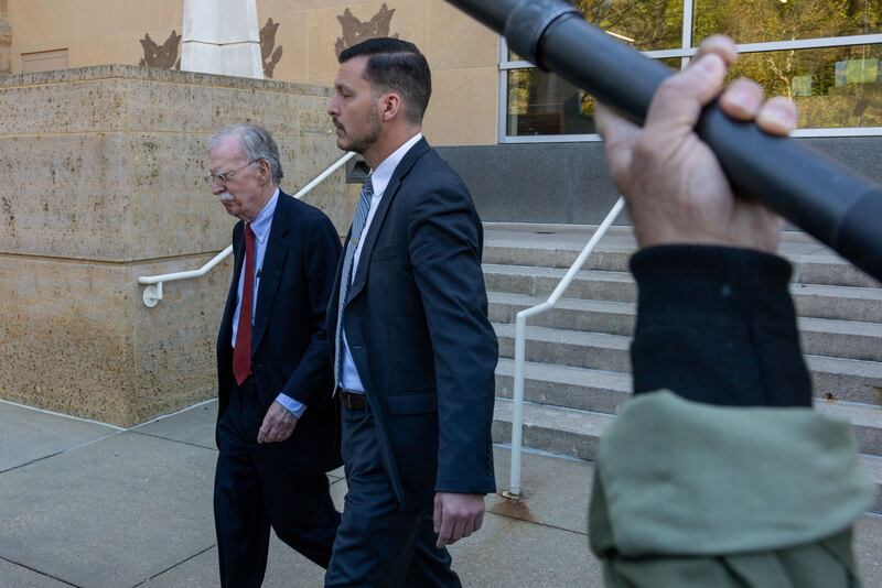 GREENBELT, MARYLAND - OCTOBER 17: Former U.S. National Security Advisor John Bolton (L) leaves the Maryland courthouse after pleading not guilty to charges of mishandling classified material on October 17, 2025 in Greenbelt, Maryland. Bolton was indicted by a federal grand jury on Thursday. (Photo by Alex Kent/Getty Images)