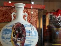 articles/2014/07/22/china-is-brewing-wine-from-tiger-bones/140719-ng-tiger-bone-wine-tease_bmit6o