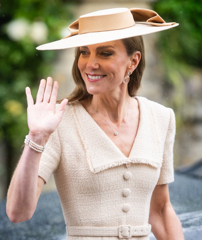 Catherine, Princess of Wales, leaves while waving after the Royal wedding of Peter Phillips and Harriet Sperling at All Saints Church in 2026