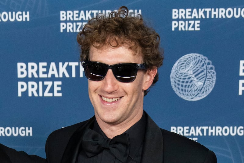 SANTA MONICA, CALIFORNIA - APRIL 05: Priscilla Chan and Mark Zuckerberg attend the 2025 Breakthrough Prize Ceremony at Barker Hangar on April 05, 2025 in Santa Monica, California. (Photo by Craig T Fruchtman/Getty Images)