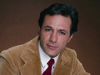 John Aprea posing for a photo in 1982.