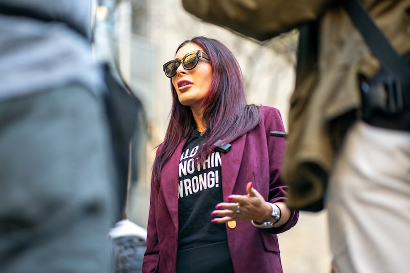 Far-right activist Laura Loomer speaks to the media.