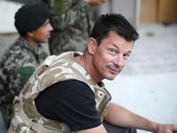 articles/2014/09/18/an-isis-hostage-taken-with-beheaded-james-foley-spouts-isis-propaganda/140918-dettmer-cantlie-tease_hnpjmx