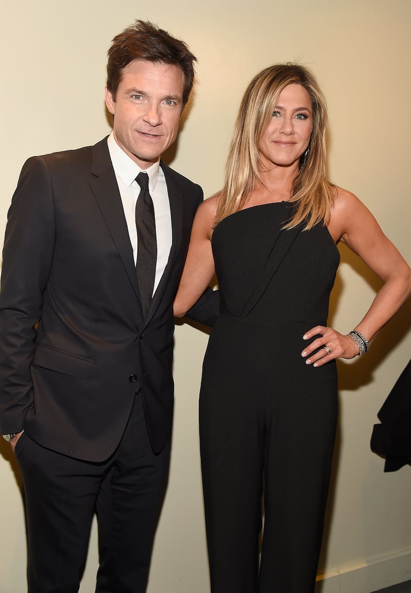 Jason Bateman and Jennifer Aniston at the screening of "Office Christmas Party" in New York City, 2016.